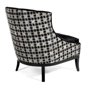 Stylish black and silver accent chair featuring a unique floral pattern, perfect for modern interior design and home decor.