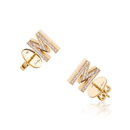 Gold letter M earrings adorned with diamonds, showcasing a stylish and elegant design for personalized jewelry.