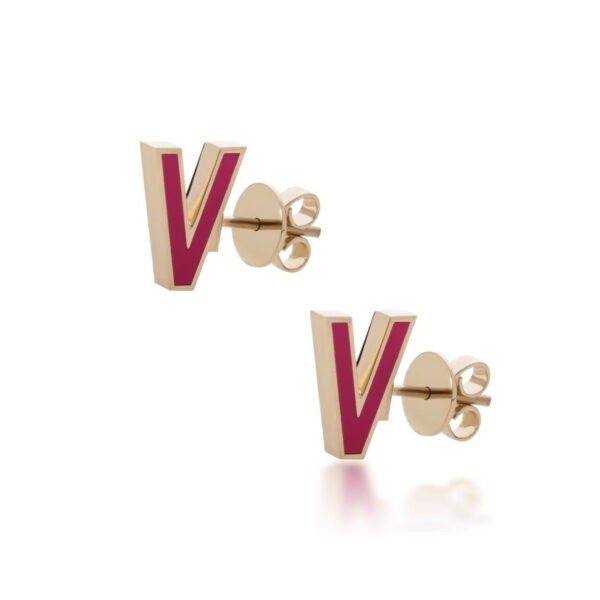 Gold earrings featuring a bold V logo design with pink accents, stylish and modern jewelry accessory.