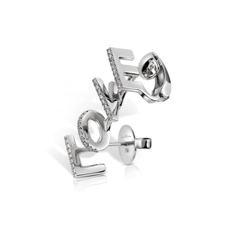 3D ear climber earring featuring the word 'LOVE' in silver with sparkling accents, designed by Susana Martins.