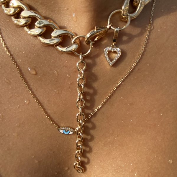 Gold mini eye and heart necklace set featuring layered chains and sparkling details, ideal for stylish accessories.
