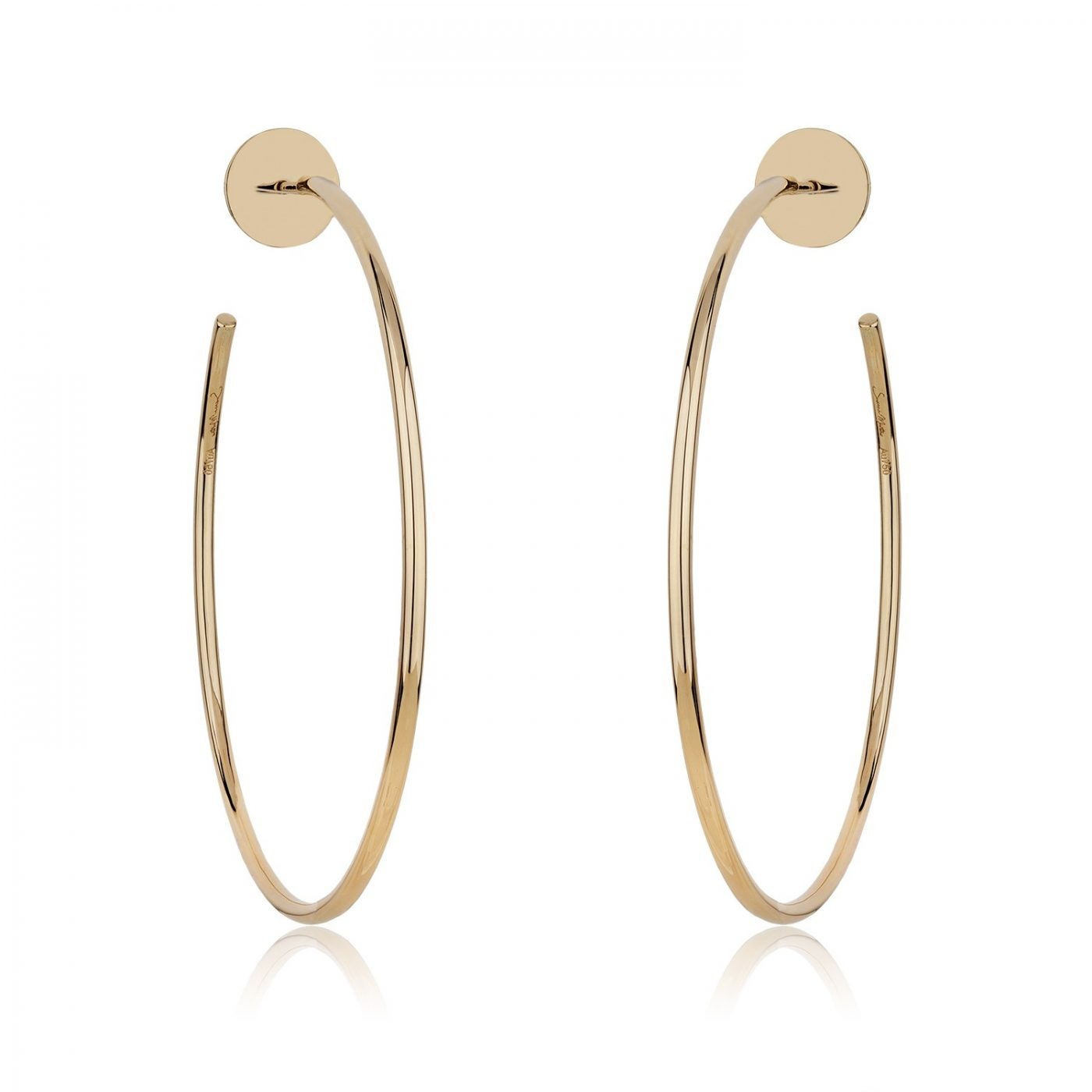 Gold plain hoop earrings featuring a sleek design, perfect for everyday wear or special occasions, enhancing any outfit with elegance.