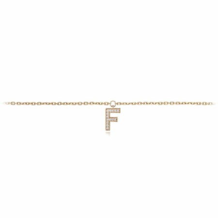 Gold anklet featuring a diamond-encrusted letter F charm, elegant jewelry piece for personal style enhancement.
