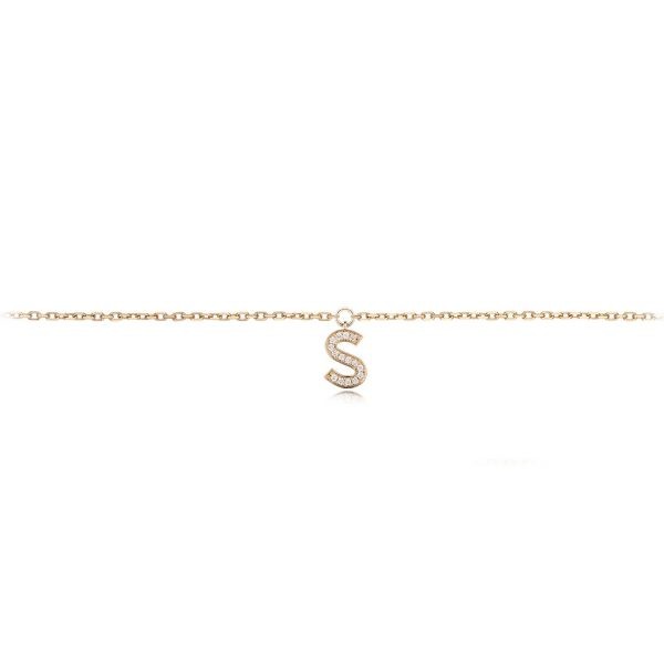 Gold anklet featuring a diamond-encrusted letter S charm, perfect for adding elegance to any outfit.