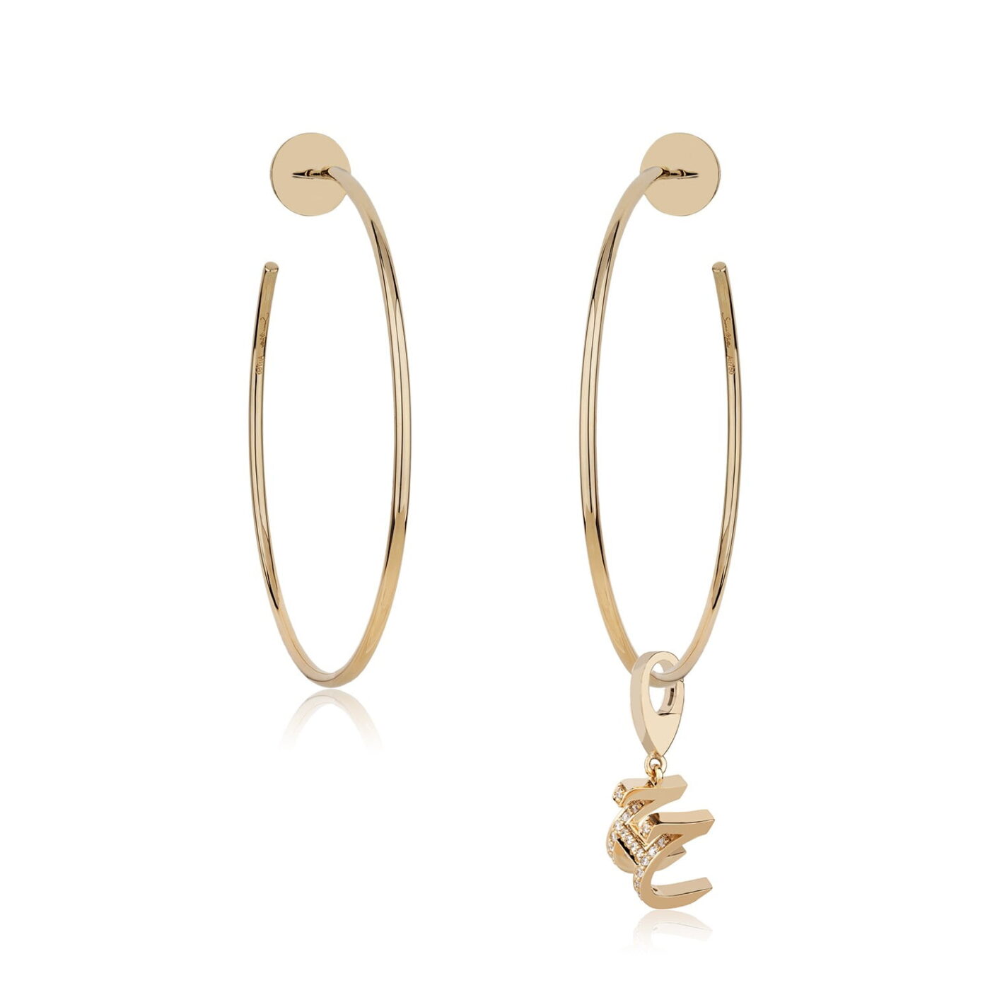 Elegant gold hoop earrings featuring a charming pendant, perfect for adding a touch of sophistication to any outfit. Ideal for everyday wear.