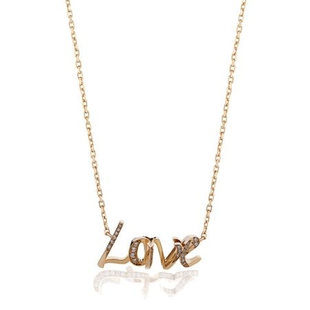 Gold necklace featuring the word 'Love' adorned with sparkling diamonds, elegant jewelry piece for any occasion.