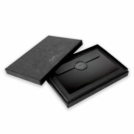 Elegant black gift card box featuring a seal, perfect for presenting gift cards or vouchers in a stylish manner.