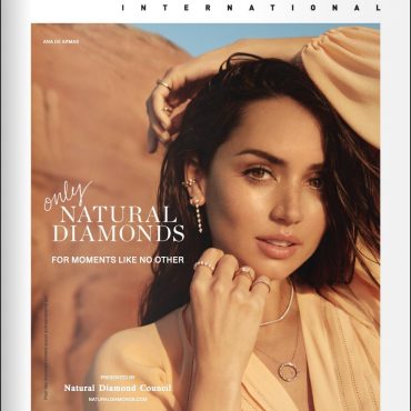 Ana de Armas wearing diamond jewelry in a magazine cover, showcasing natural diamonds with elegant design.