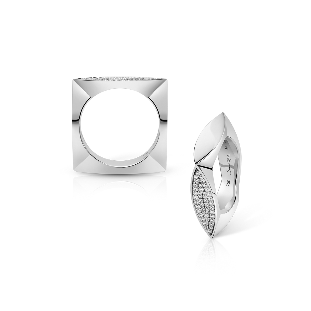 Two silver rings featuring geometric shapes and diamond accents, one square and one oval-shaped.