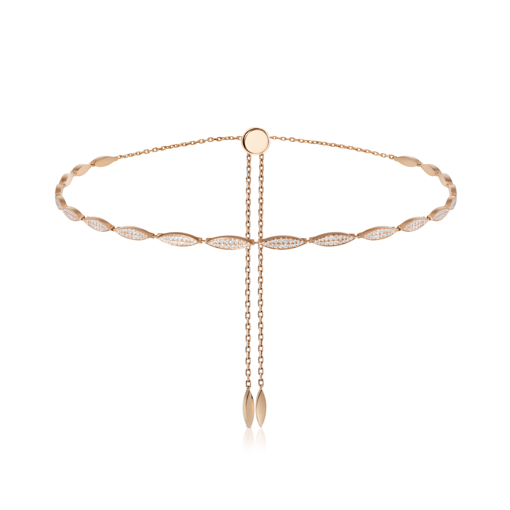 Gold choker necklace featuring enamel links and a chain with dangling ends.