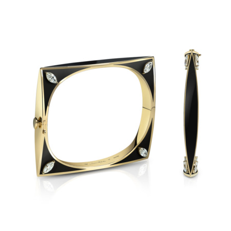 Les Marchioness bangle featuring a yellow gold frame with black enamel and decorative elements.