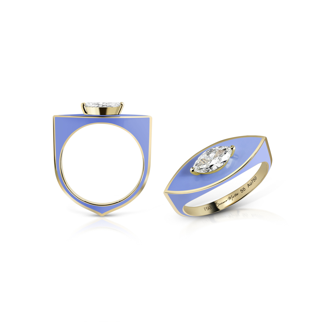 Marquise cut diamond ring featuring a blue enamel band and gold accents.