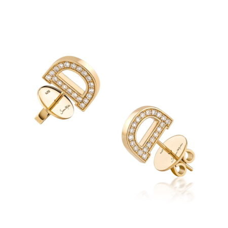 Gold letter D studs adorned with diamonds, showcasing a modern and elegant design for jewelry enthusiasts.