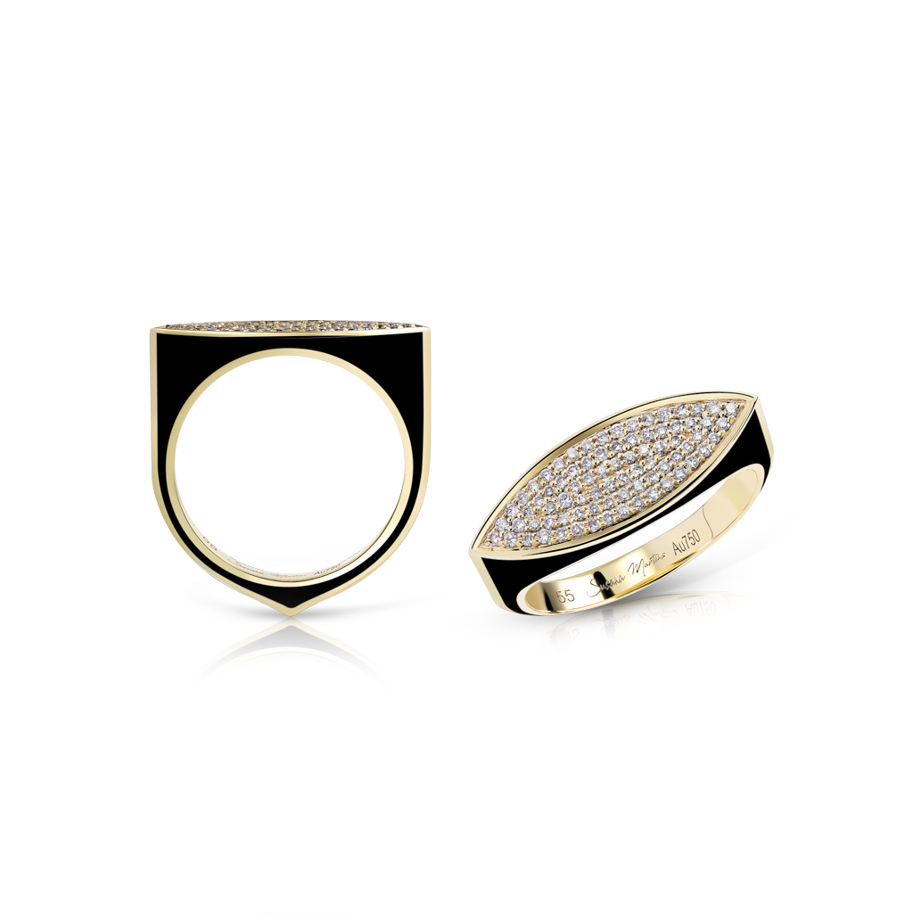 Gold and black ring featuring a marquise design with pave-set stones on the surface.