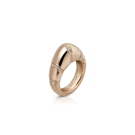 Rose gold dome ring featuring smooth and textured sections with diamond accents.
