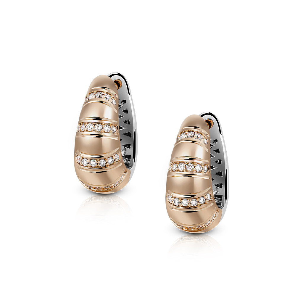Gold and silver hoop earrings featuring diamond accents in a spiral design.