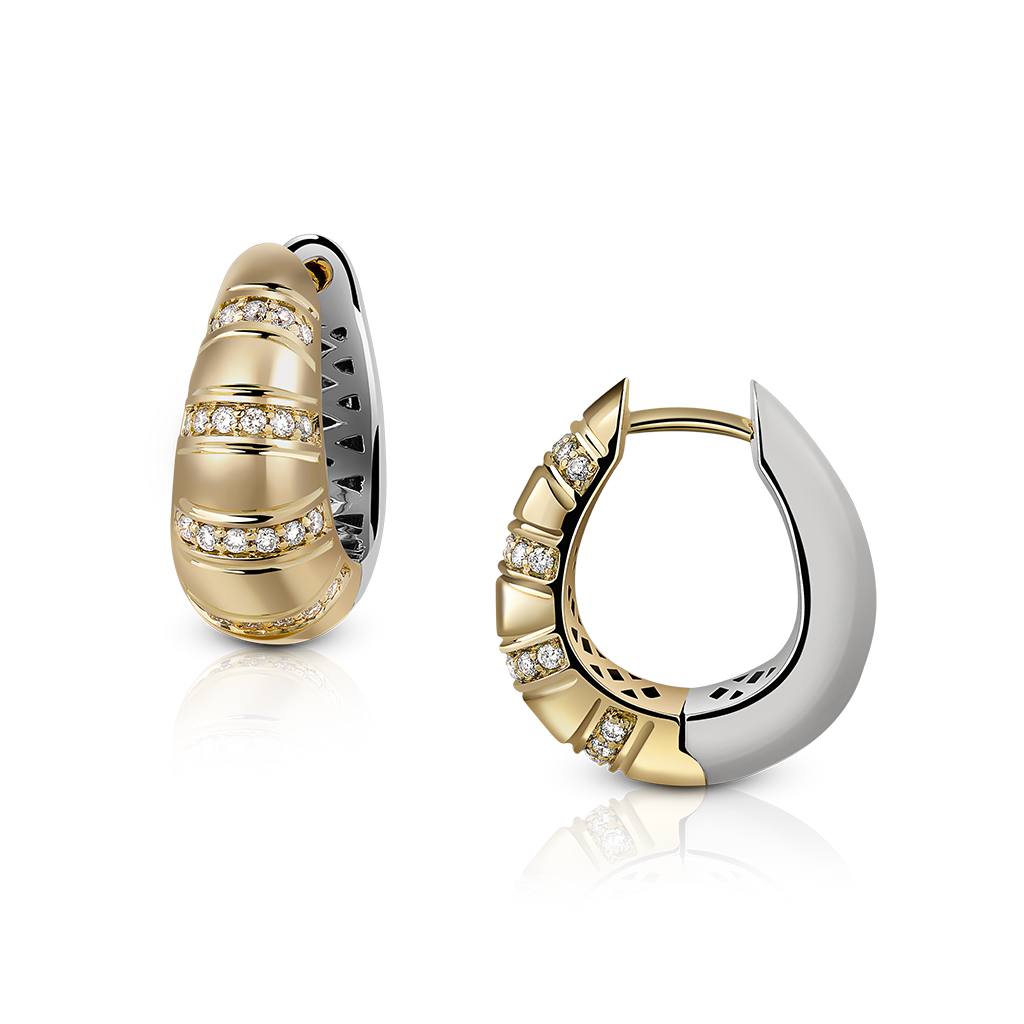 A pair of gold and silver hoop earrings featuring diamond accents on one earring.