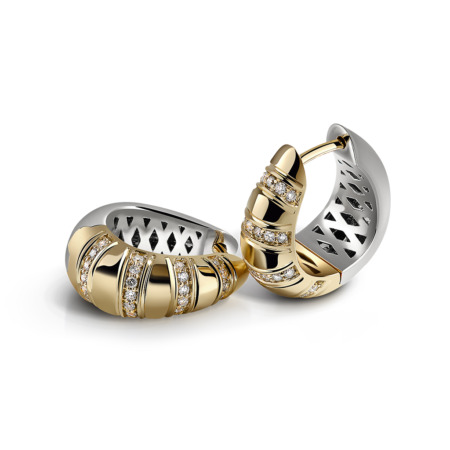 A pair of gold and silver hoop earrings featuring diamond accents and a textured design.