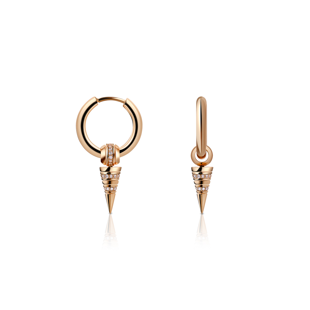 Gold huggie earrings featuring diamond accents and a unique spike design, showcasing elegance and modern style.