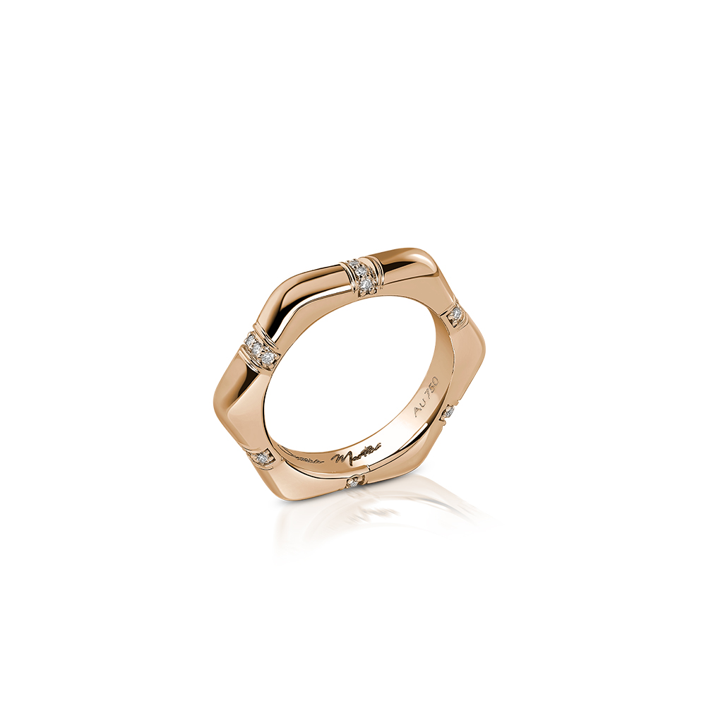 Rose gold hexagonal ring featuring small diamonds set in the band.