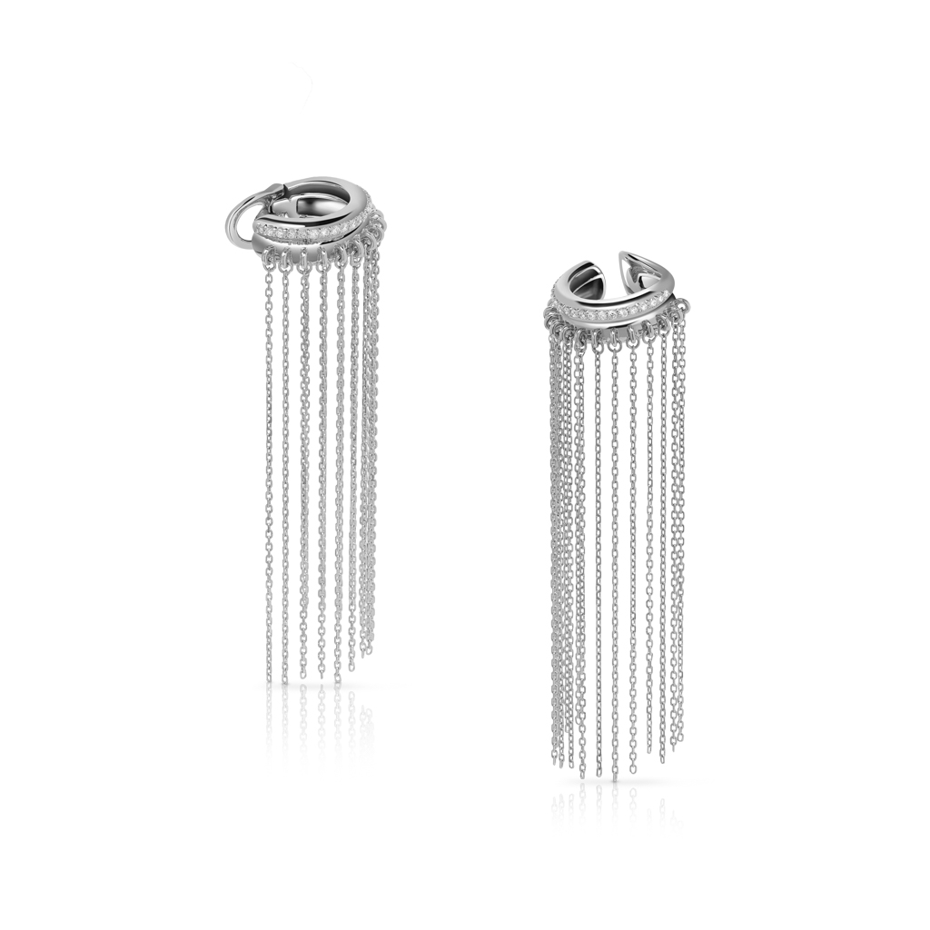 Silver ear cuff featuring multiple hanging fringes for a decorative effect.