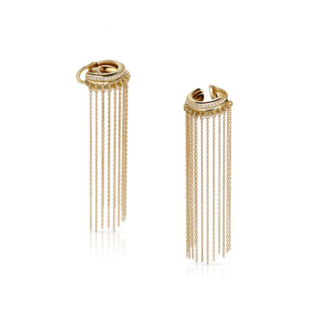 Gold ear cuff featuring multiple hanging chains that create a fringe effect.