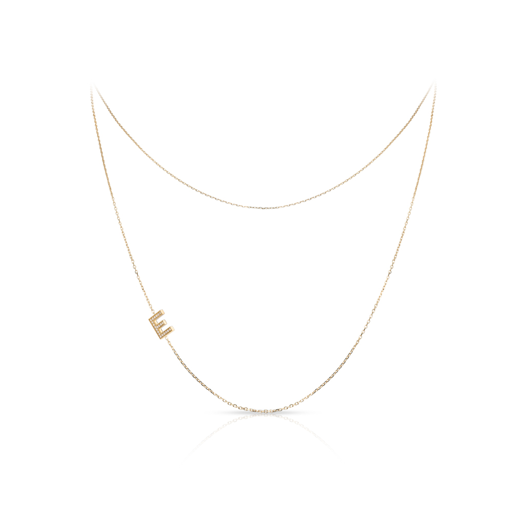 Gold necklace featuring an initial 'E' pendant, designed for a stylish and personalized accessory. Perfect for gifting or personal wear.
