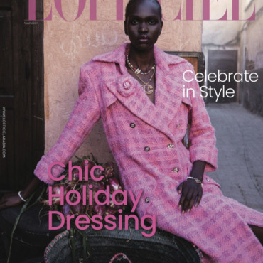 L'Officiel Arabia magazine cover featuring a model in a pink coat, showcasing chic holiday dressing for March 2024.