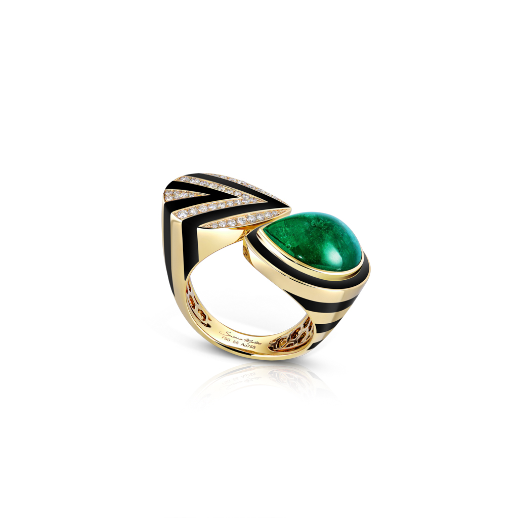 Gold ring featuring a large emerald stone and diamond accents in a unique design.