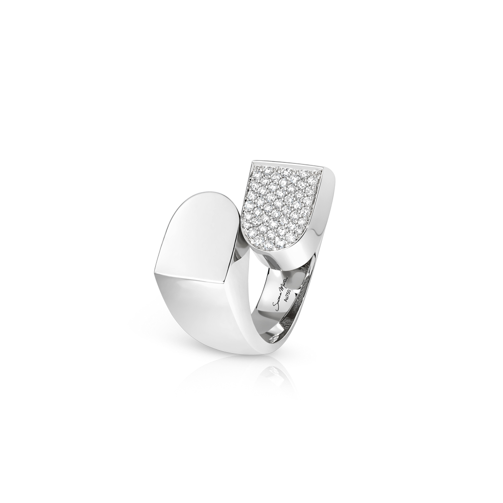 Silver Toi Et Moi ring featuring a diamond-frosted top section with a smooth band.