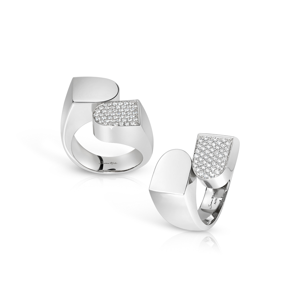 Two silver rings with diamond frosting accents arranged side by side on a white background.