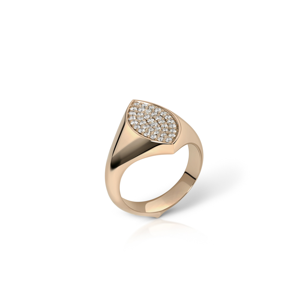 Gold signet ring featuring a marquise-shaped top with paved stones set in a polished band.