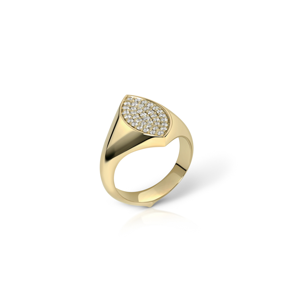 Gold signet ring featuring a marquise-shaped top with paved stones for decoration.