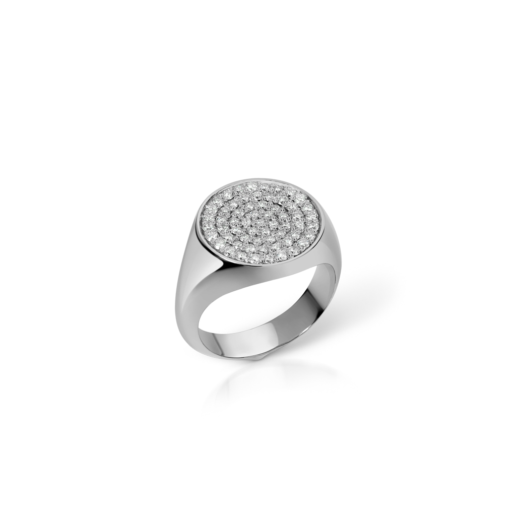 Round signet ring in white gold featuring a paved diamond surface.