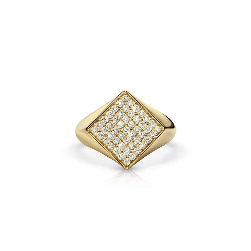 Gold signet ring featuring a diamond-studded square top design.
