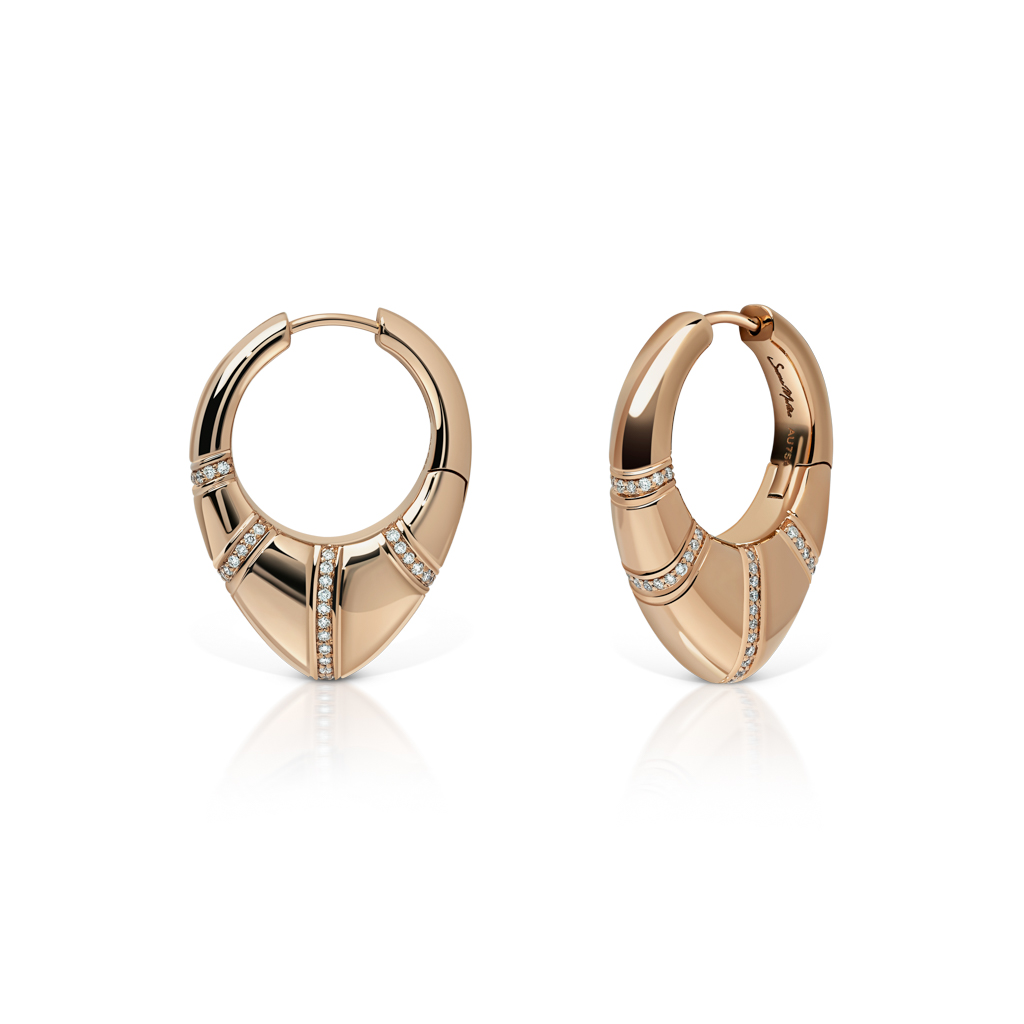 Gold and silver hoop earrings featuring diamond accents in a modern design.