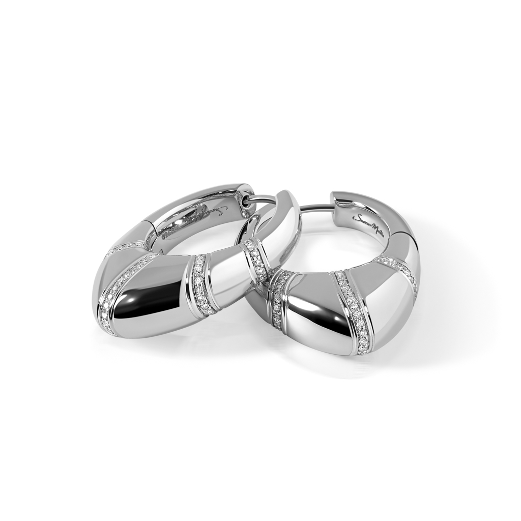 A pair of silver hoop earrings featuring diamond accents in a polished finish.