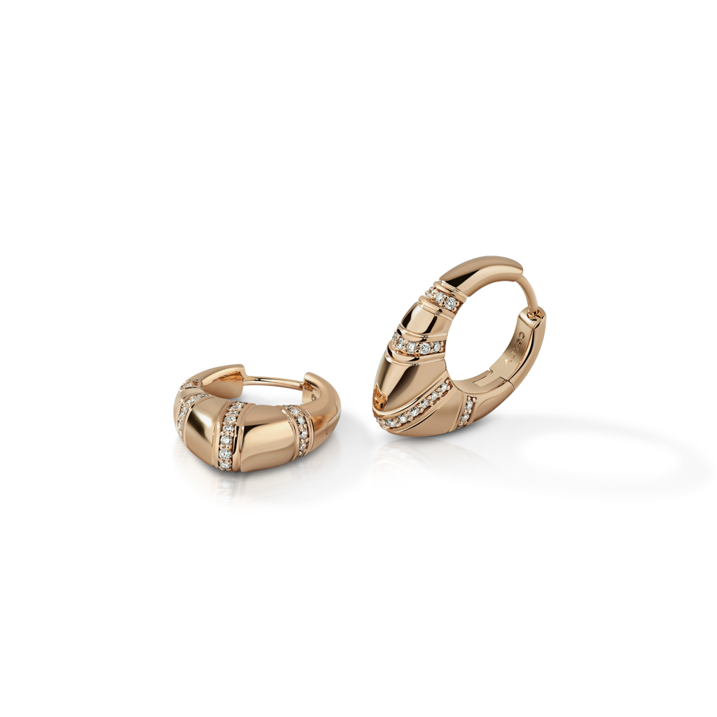 Pair of gold hoop earrings featuring diamond accents in a modern design.
