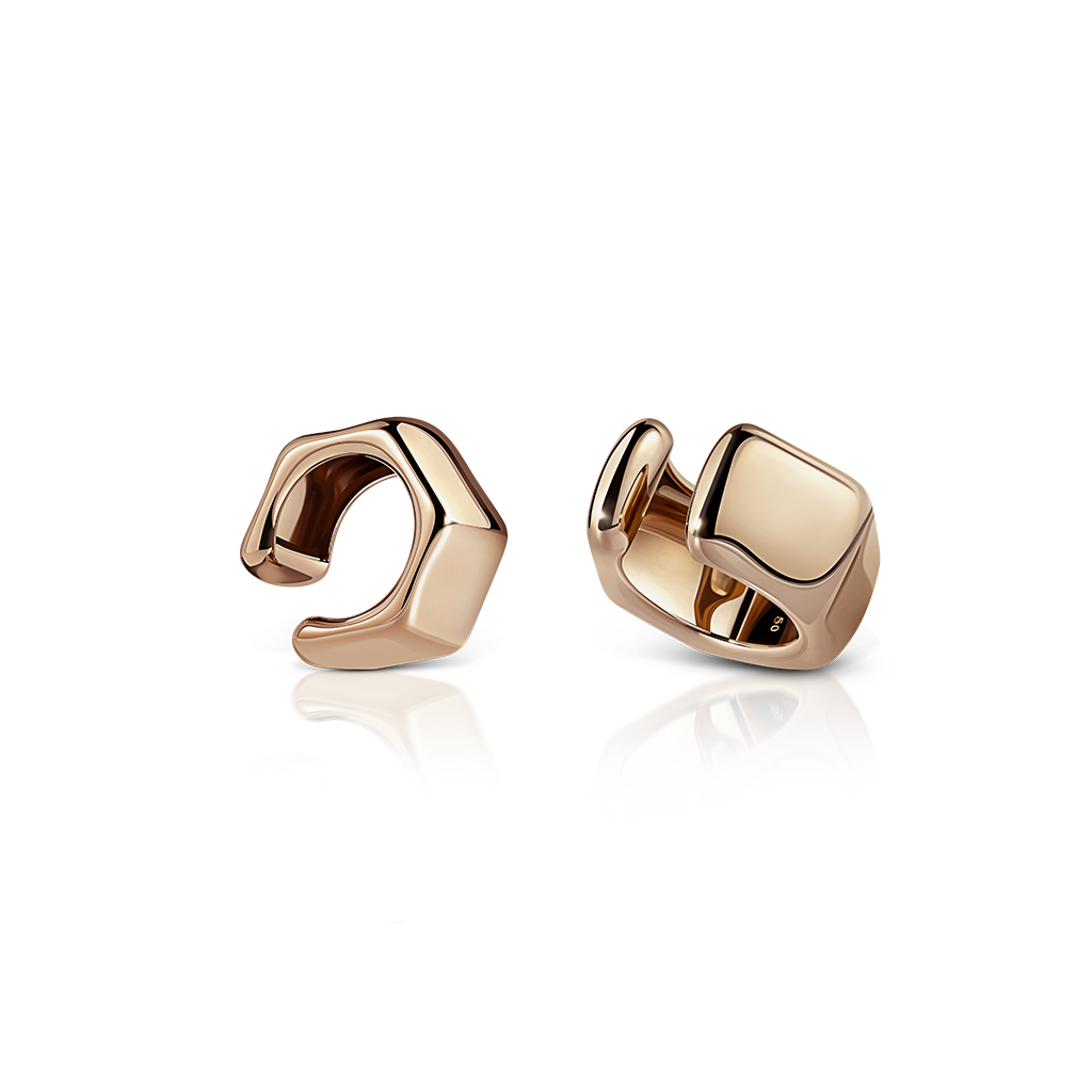 Two gold-colored ear cuffs with a smooth, modern design displayed against a white background.