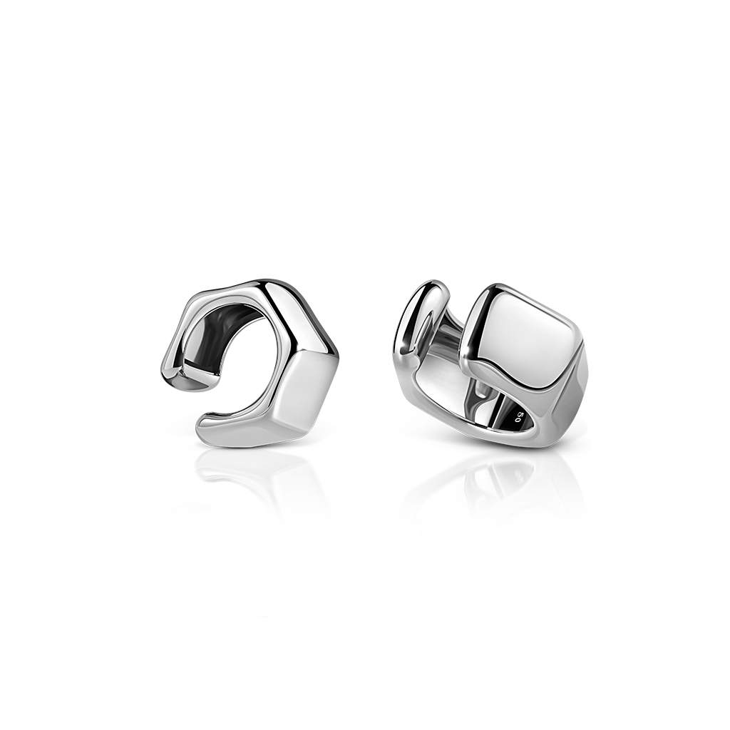 Two silver ear cuffs with a modern design, featuring a smooth and polished surface.