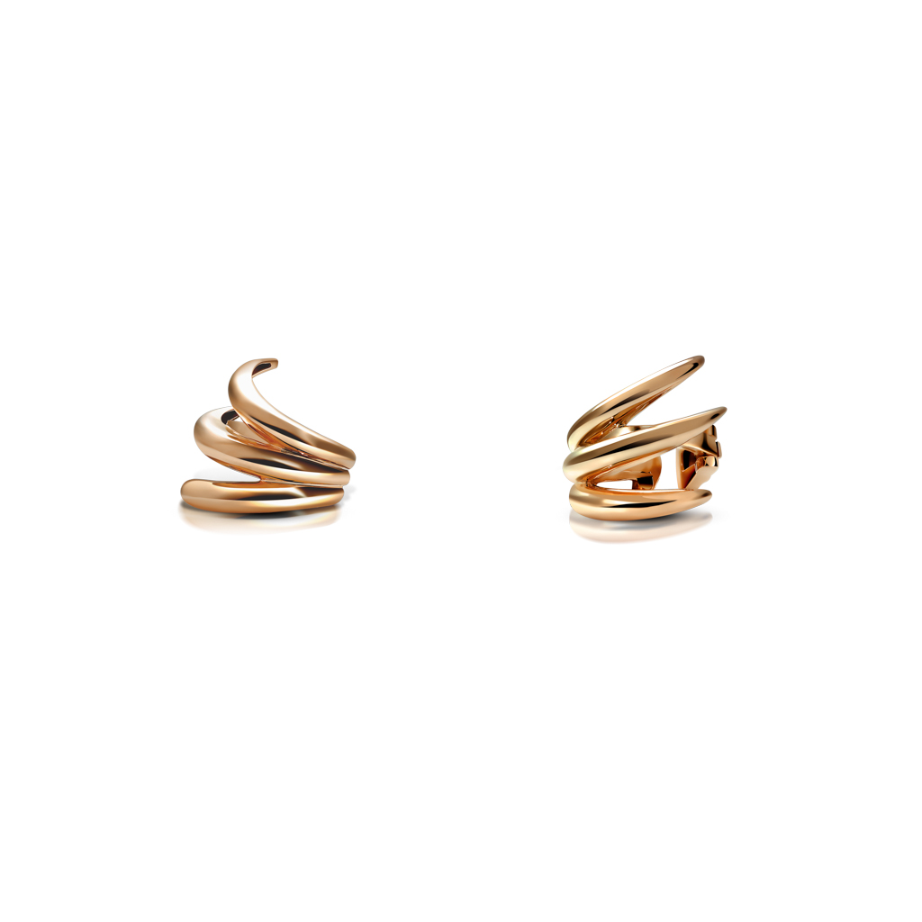 A pair of gold spiral ear cuff earrings with a smooth, curved design.
