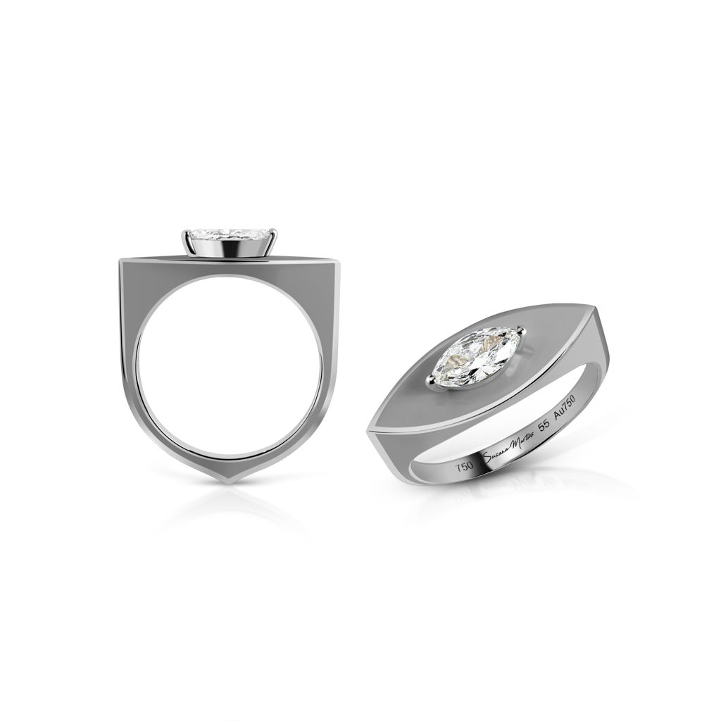 Marquise cut diamond ring set in white gold with a unique design featuring a shield shape.