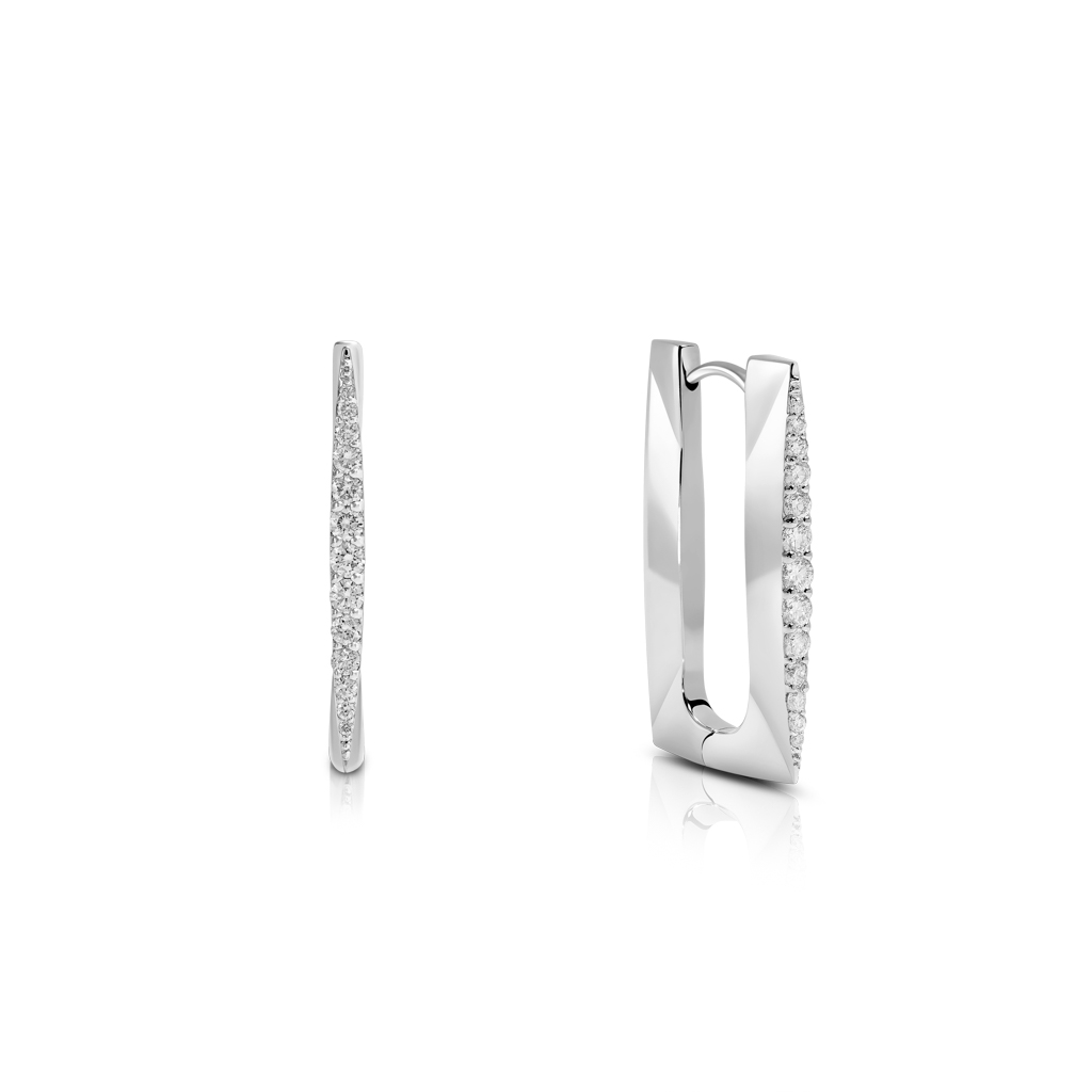 Silver hoop earrings featuring a row of small diamonds along one side.