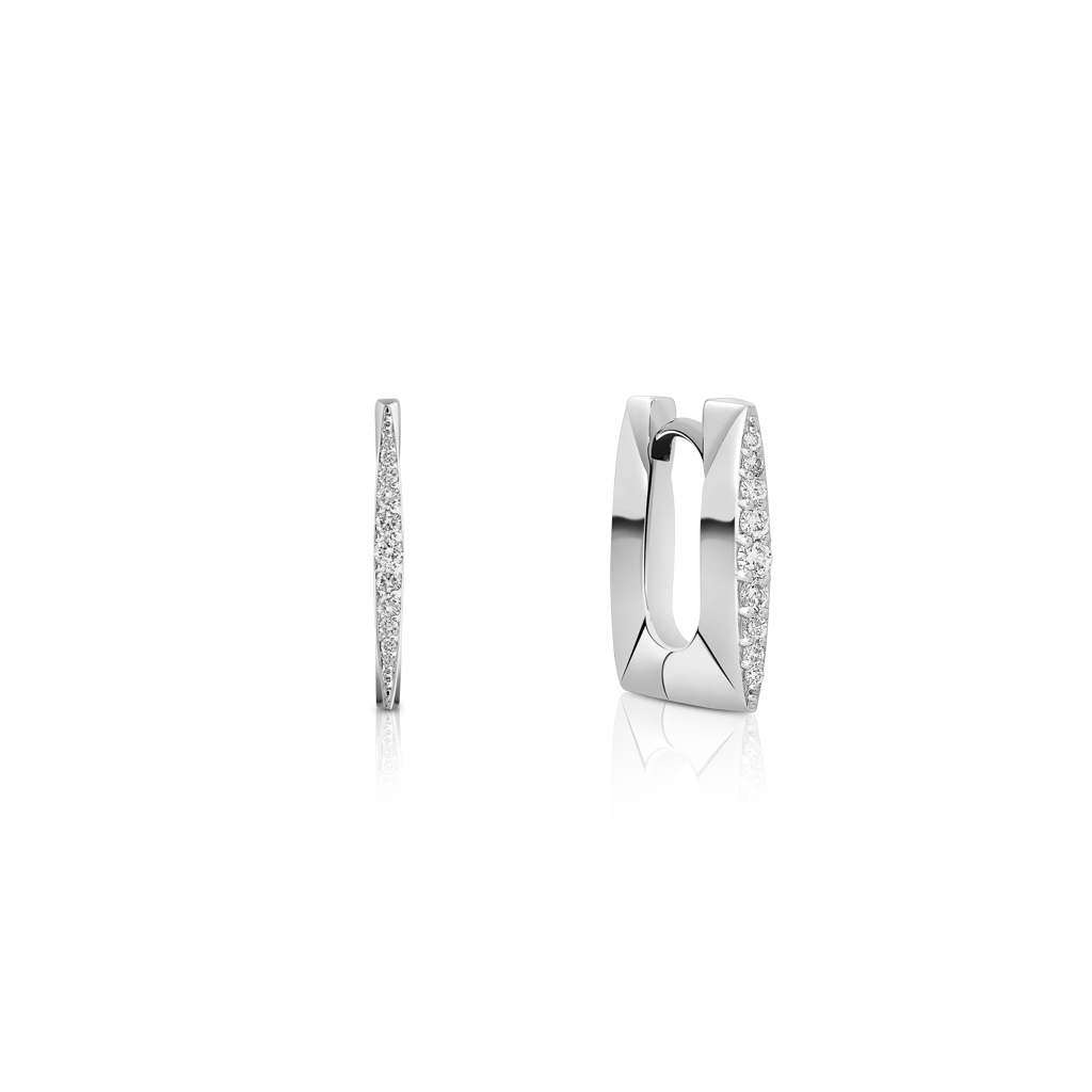 Silver hoop earrings featuring diamond accents along one side in a sleek design.